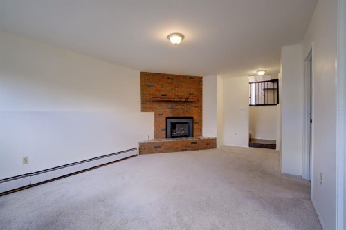 664 49 Avenue West, Claresholm, AB - Indoor With Fireplace