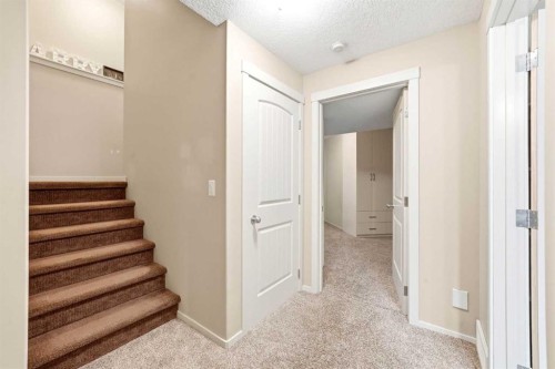 7942 Cougar Ridge Avenue Sw, Calgary, AB - Indoor Photo Showing Other Room