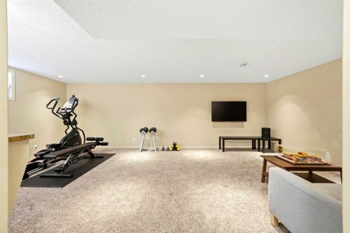 7942 Cougar Ridge Avenue Sw, Calgary, AB - Indoor Photo Showing Gym Room