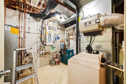 7942 Cougar Ridge Avenue Sw, Calgary, AB - Indoor Photo Showing Basement