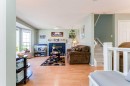 198 Somerside Park Sw, Calgary, AB  - Indoor Photo Showing Living Room With Fireplace 