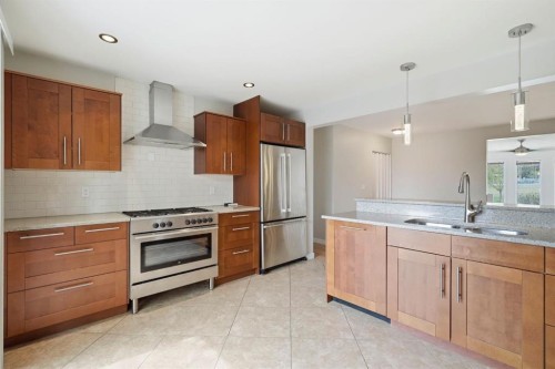 5212 Terry Road Nw, Calgary, AB - Indoor Photo Showing Kitchen With Stainless Steel Kitchen With Double Sink