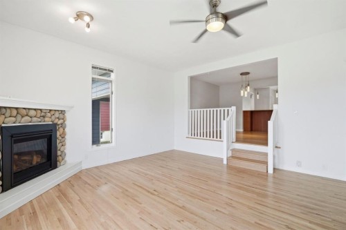 5212 Terry Road Nw, Calgary, AB - Indoor Photo Showing Living Room With Fireplace
