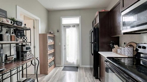 54 New Brighton Point Se, Calgary, AB - Indoor Photo Showing Kitchen