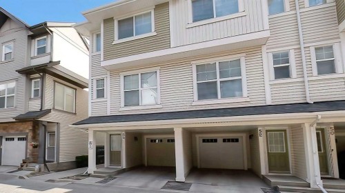 54 New Brighton Point Se, Calgary, AB - Outdoor With Facade