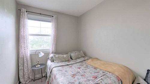 54 New Brighton Point Se, Calgary, AB - Indoor Photo Showing Bedroom