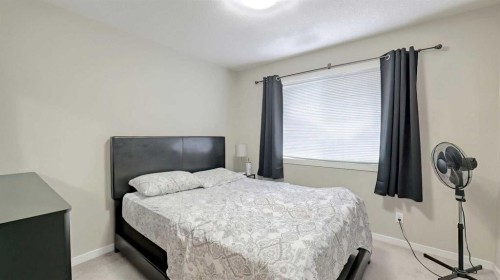54 New Brighton Point Se, Calgary, AB - Indoor Photo Showing Bedroom