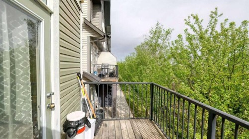 54 New Brighton Point Se, Calgary, AB - Outdoor With Balcony With Exterior