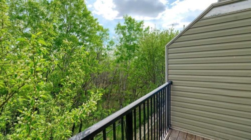 54 New Brighton Point Se, Calgary, AB - Outdoor With Balcony With Exterior