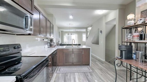 54 New Brighton Point Se, Calgary, AB - Indoor Photo Showing Kitchen
