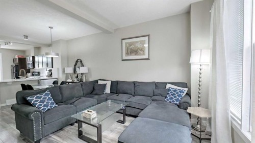 54 New Brighton Point Se, Calgary, AB - Indoor Photo Showing Living Room