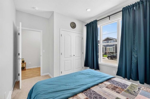 132 Seton Villas Se, Calgary, AB - Indoor Photo Showing Bedroom