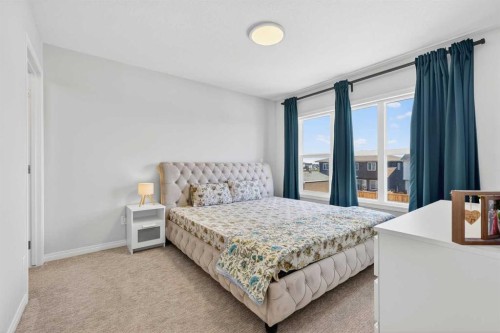 132 Seton Villas Se, Calgary, AB - Indoor Photo Showing Bedroom