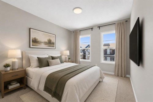 132 Seton Villas Se, Calgary, AB - Indoor Photo Showing Bedroom