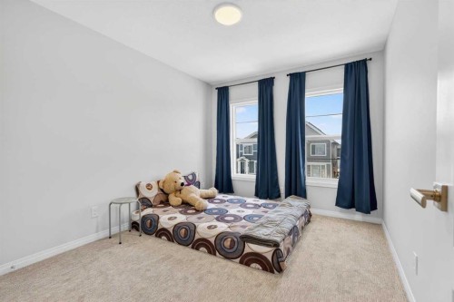 132 Seton Villas Se, Calgary, AB - Indoor Photo Showing Bedroom