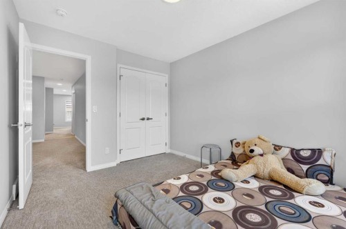 132 Seton Villas Se, Calgary, AB - Indoor Photo Showing Bedroom
