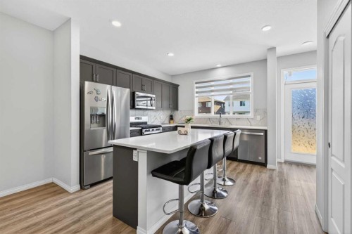 132 Seton Villas Se, Calgary, AB - Indoor Photo Showing Kitchen With Upgraded Kitchen