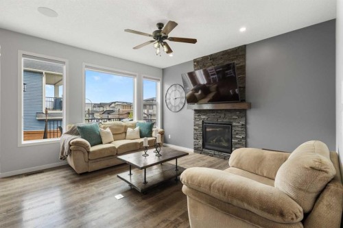 92 Sage Bluff Way Nw, Calgary, AB - Indoor Photo Showing Living Room With Fireplace