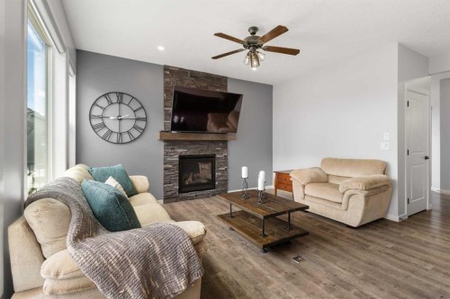 92 Sage Bluff Way Nw, Calgary, AB - Indoor Photo Showing Living Room With Fireplace