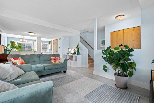 63 Falmere Way Ne, Calgary, AB - Indoor Photo Showing Living Room