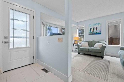 63 Falmere Way Ne, Calgary, AB - Indoor Photo Showing Living Room