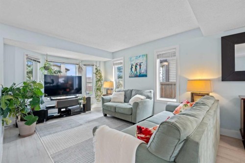 63 Falmere Way Ne, Calgary, AB - Indoor Photo Showing Living Room
