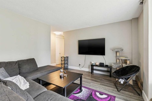 208-315 Heritage Drive Se, Calgary, AB - Indoor Photo Showing Living Room
