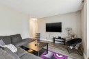 208-315 Heritage Drive Se, Calgary, AB  - Indoor Photo Showing Living Room 