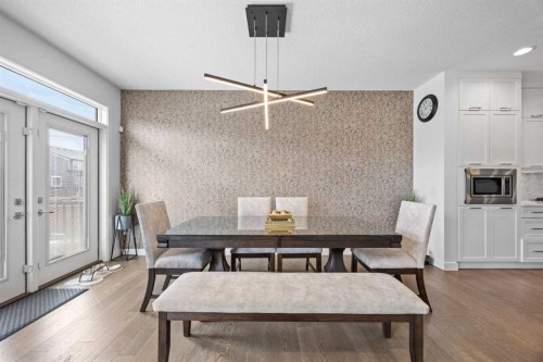 10 Evansfield Green Nw, Calgary, AB - Indoor Photo Showing Dining Room