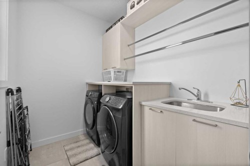 10 Evansfield Green Nw, Calgary, AB - Indoor Photo Showing Laundry Room