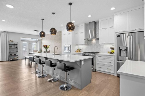 10 Evansfield Green Nw, Calgary, AB - Indoor Photo Showing Kitchen With Stainless Steel Kitchen With Upgraded Kitchen