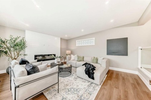 275 Silverview Way Nw, Calgary, AB - Indoor Photo Showing Living Room With Fireplace