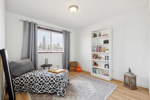 56 Riverbrook Road Se, Calgary, AB - Indoor Photo Showing Bedroom