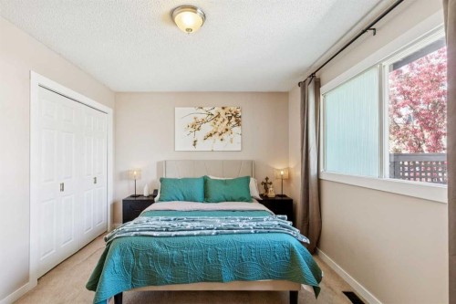 56 Riverbrook Road Se, Calgary, AB - Indoor Photo Showing Bedroom