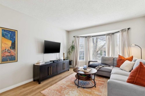 56 Riverbrook Road Se, Calgary, AB - Indoor Photo Showing Living Room