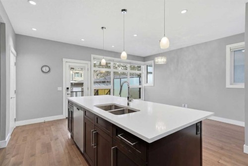 2018 37 Street Sw, Calgary, AB - Indoor Photo Showing Kitchen With Double Sink With Upgraded Kitchen