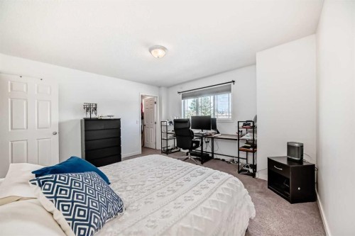 54 Panatella Park Nw, Calgary, AB - Indoor Photo Showing Bedroom