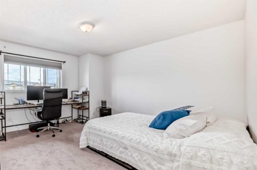 54 Panatella Park Nw, Calgary, AB - Indoor Photo Showing Bedroom