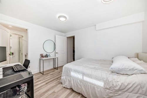 54 Panatella Park Nw, Calgary, AB - Indoor Photo Showing Bedroom