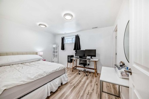 54 Panatella Park Nw, Calgary, AB - Indoor Photo Showing Bedroom