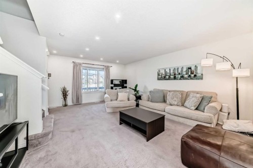 54 Panatella Park Nw, Calgary, AB - Indoor Photo Showing Living Room