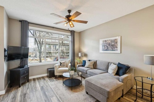 166 Legacy Common Se, Calgary, AB - Indoor Photo Showing Living Room