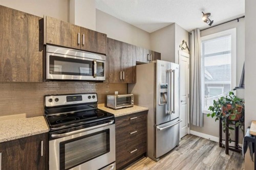 166 Legacy Common Se, Calgary, AB - Indoor Photo Showing Kitchen