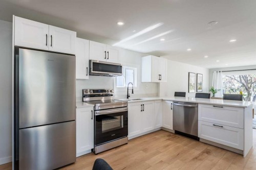 36 Big Hill Way Se, Airdrie, AB - Indoor Photo Showing Kitchen With Stainless Steel Kitchen
