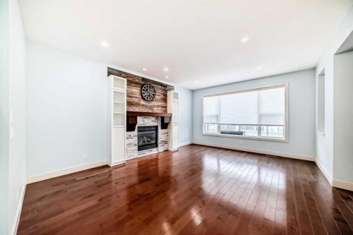 331 Royal Oak Heath Nw, Calgary, AB - Indoor Photo Showing Living Room With Fireplace