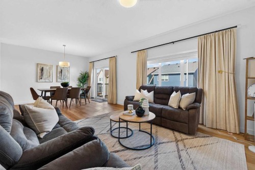 309 Baneberry Way Sw, Airdrie, AB - Indoor Photo Showing Living Room