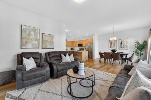 309 Baneberry Way Sw, Airdrie, AB - Indoor Photo Showing Living Room