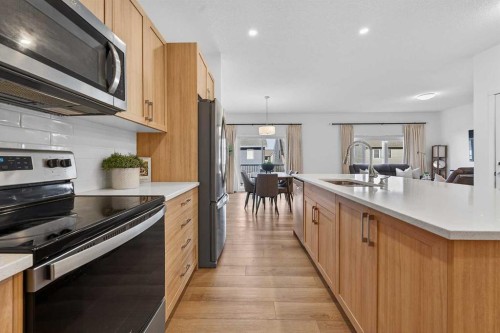 309 Baneberry Way Sw, Airdrie, AB - Indoor Photo Showing Kitchen