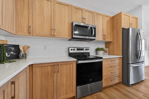 309 Baneberry Way Sw, Airdrie, AB - Indoor Photo Showing Kitchen