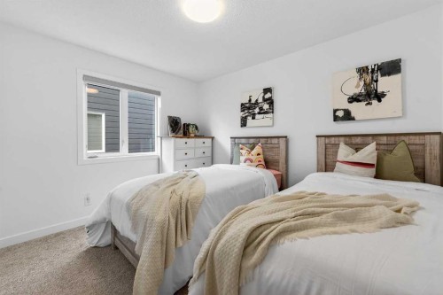 309 Baneberry Way Sw, Airdrie, AB - Indoor Photo Showing Bedroom